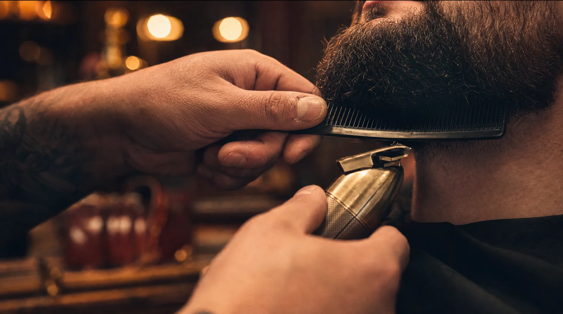 Close detail of a barber's hands at work, precision and craft